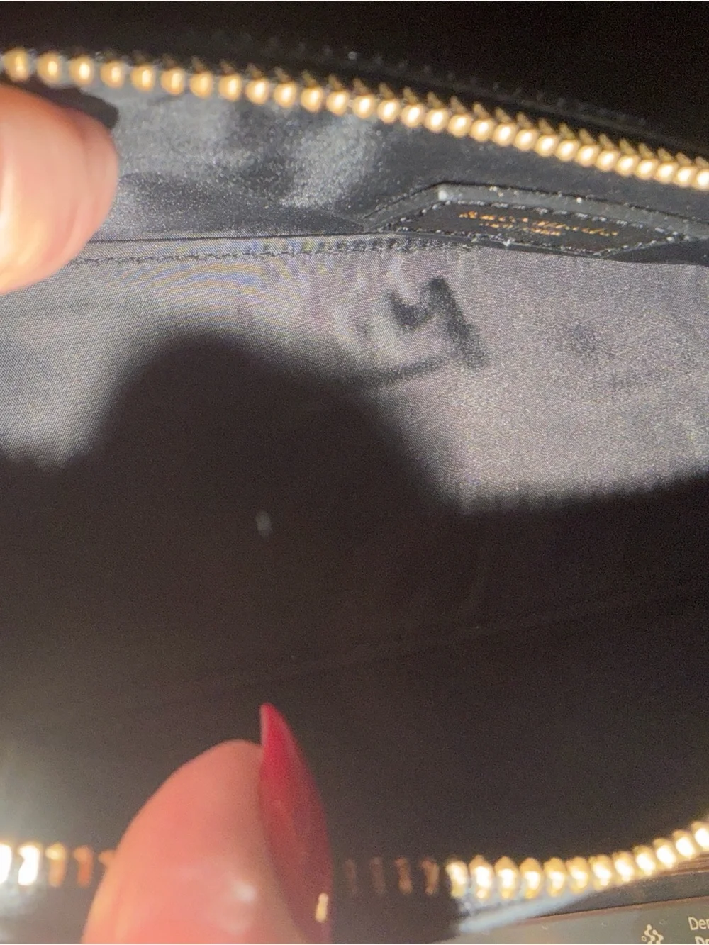 kate spade black zip cosmetic case with gold logo